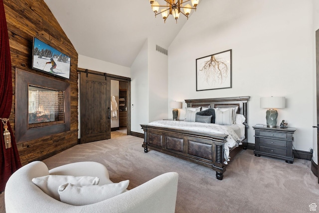 8435 N Ranch Garden Rd, Park City, UT 84098 - bedroom with carpet flooring, a barn door, a chandelier, high vaulted ceiling, and baseboards