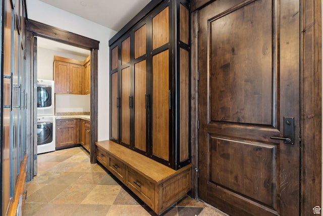 8435 N Ranch Garden Rd, Park City, UT 84098 - mudroom with stacked washer / dryer and light stone finish flooring