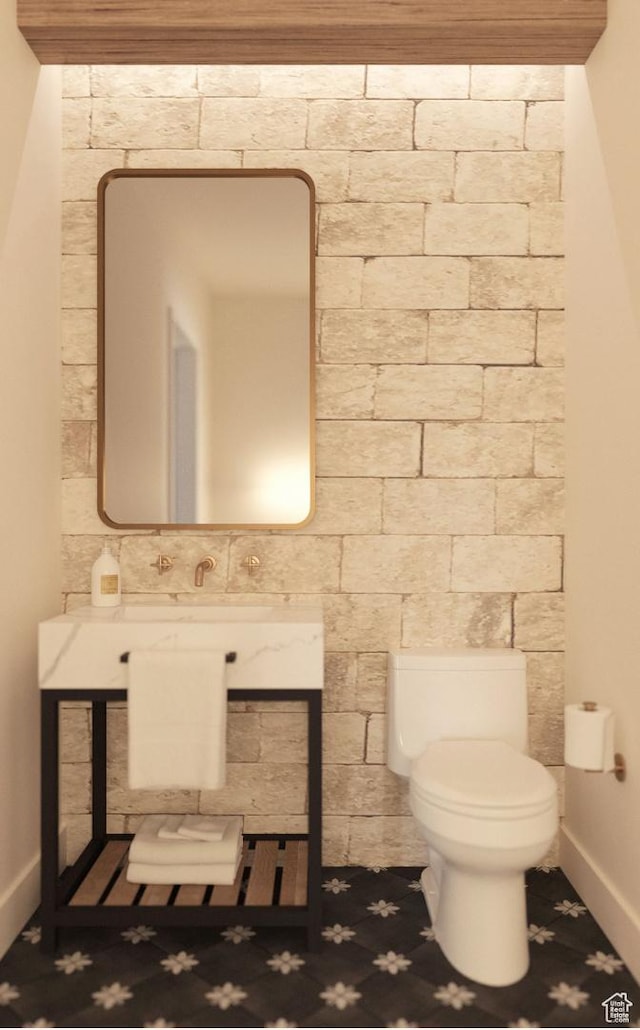 bathroom featuring toilet