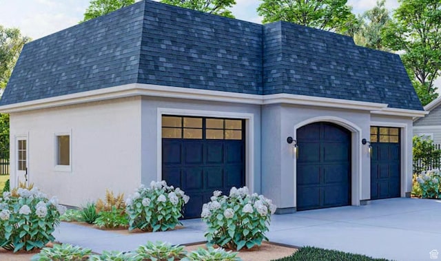 208 W Stone Gate Ln, Provo, UT 84604 - view of front of house with roof with shingles, mansard roof, concrete driveway, a garage, and stucco siding