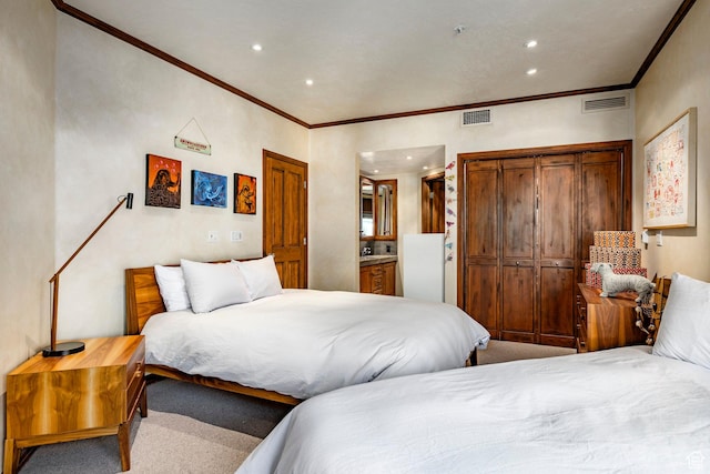 751 Main St Unit 415, Park City, UT 84060 - bedroom with ornamental molding, ensuite bathroom, and carpet flooring