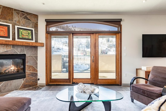 751 Main St Unit 415, Park City, UT 84060 - living room with hardwood / wood-style flooring and a tile fireplace