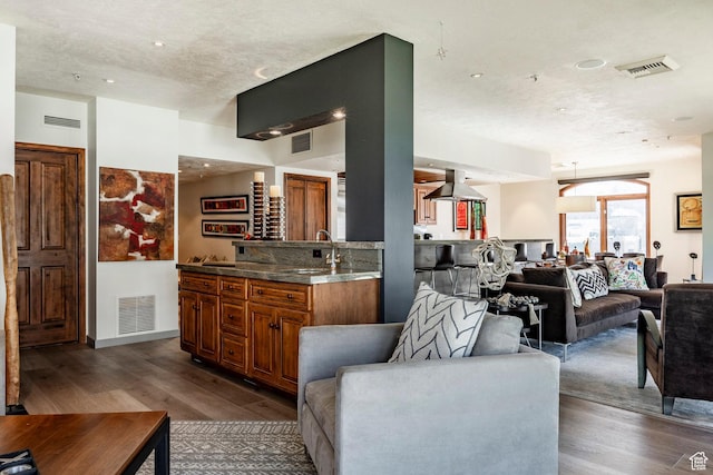 751 Main St Unit 415, Park City, UT 84060 - living room with dark hardwood / wood-style floors, sink, and a textured ceiling