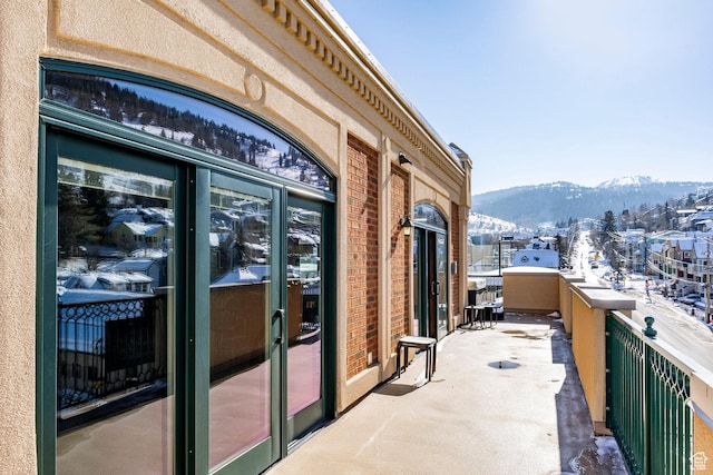751 Main St Unit 415, Park City, UT 84060 - snow covered back of property featuring a mountain view