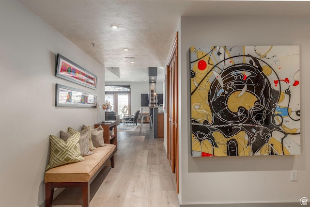 751 Main St Unit 415, Park City, UT 84060 - hall with a textured ceiling and light wood-type flooring