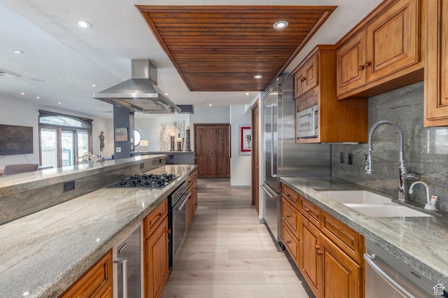 751 Main St Unit 415, Park City, UT 84060 - kitchen featuring wine cooler, sink, built in appliances, island exhaust hood, and light stone countertops