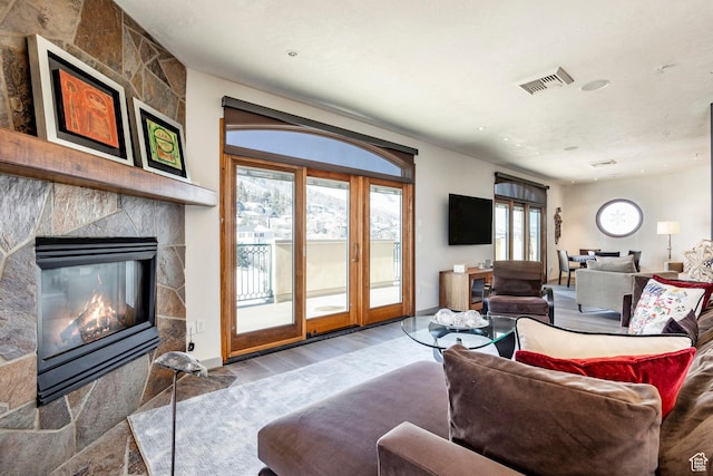 751 Main St Unit 415, Park City, UT 84060 - living room featuring hardwood / wood-style floors and a fireplace