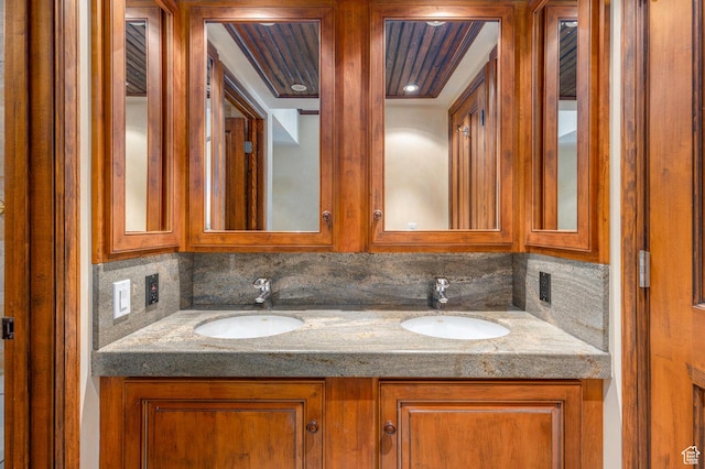 751 Main St Unit 415, Park City, UT 84060 - bathroom featuring vanity and decorative backsplash