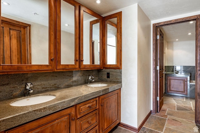 751 Main St Unit 415, Park City, UT 84060 - bathroom with vanity and decorative backsplash