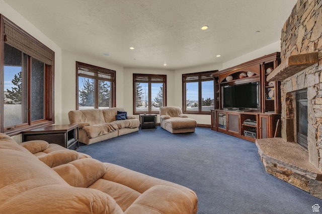 4230 Moosehollow Rd, Park City, UT 84098 - carpeted living room featuring a stone fireplace and a textured ceiling