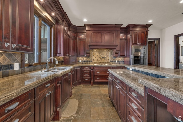 4230 Moosehollow Rd, Park City, UT 84098 - kitchen featuring light stone counters, sink, decorative backsplash, and stainless steel appliances