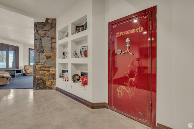 4230 Moosehollow Rd, Park City, UT 84098 - hallway with built in shelves and concrete flooring