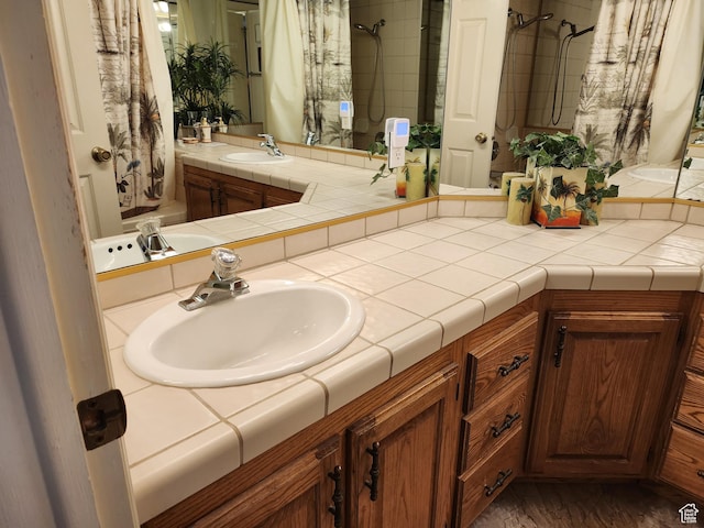 bathroom featuring vanity and walk in shower