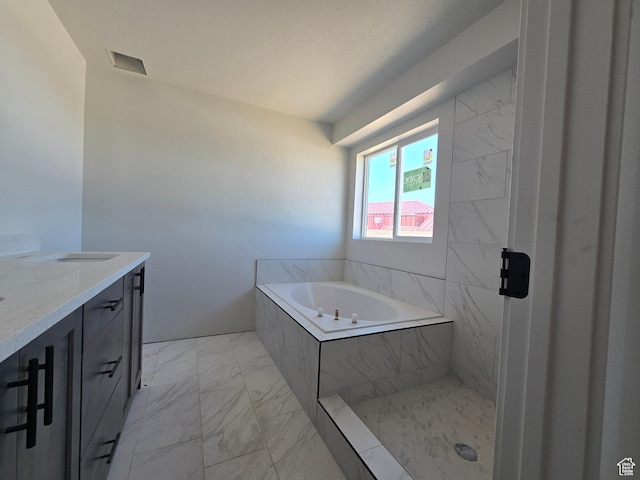 1928 W 1340 N, Clinton, UT 84015 - full bath with marble look tiles, vanity, and a garden tub