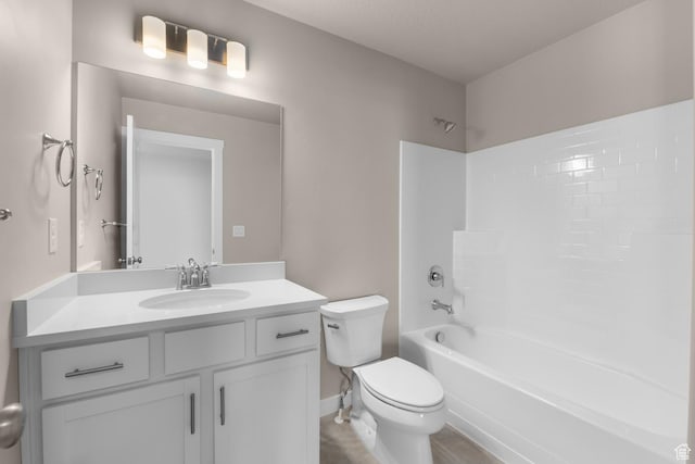 541 W Coyote Ridge Rd, Grantsville, UT 84029 - full bathroom with washtub / shower combination, vanity, and toilet
