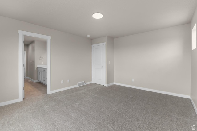 541 W Coyote Ridge Rd, Grantsville, UT 84029 - unfurnished room featuring light carpet