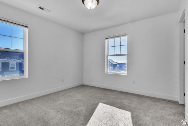 view of carpeted spare room