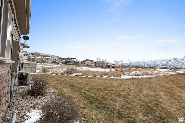 9317 N Prairie Dunes Way, Eagle Mountain, UT 84005 - snowy yard with central AC unit and a mountain view