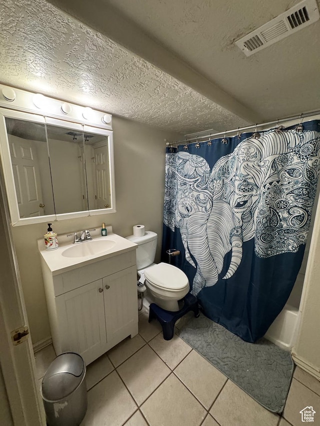 1050 S 500 W, Vernal, UT 84078 - bathroom featuring a textured ceiling, visible vents, vanity, and tile patterned flooring