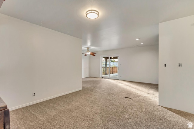 2573 Jordan Meadows Ln, West Jordan, UT 84084 - unfurnished living room with carpet flooring and ceiling fan