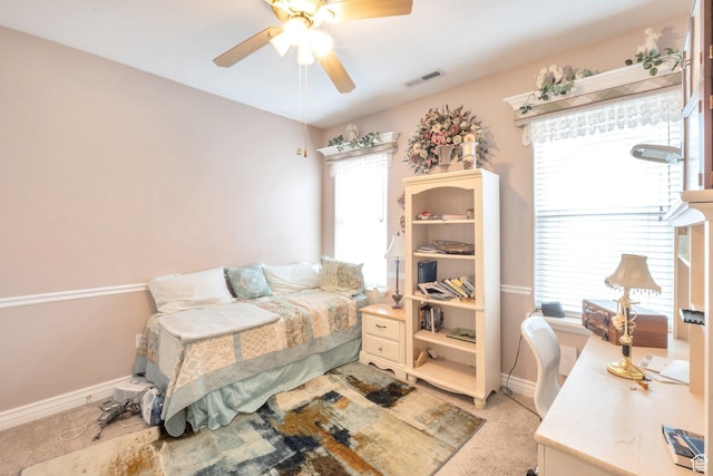 1839 E River Bottom Rd, Springville, UT 84663 - bedroom with light carpet, a ceiling fan, and a desk