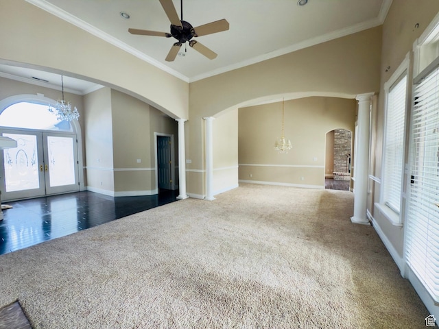 1839 E River Bottom Rd, Springville, UT 84663 - carpeted spare room with arched walkways, french doors, decorative columns, a chandelier, and crown molding
