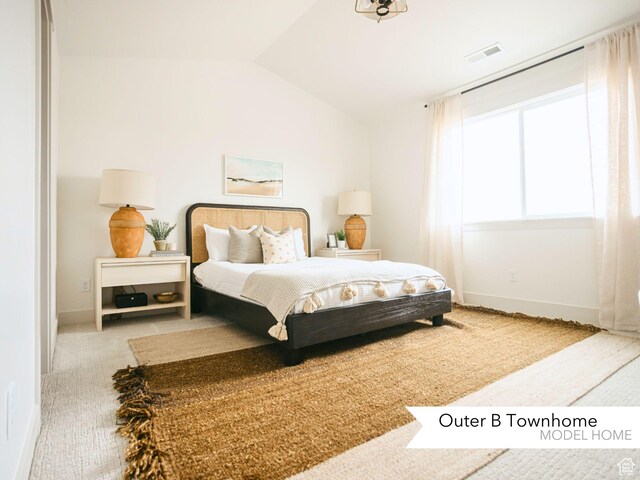 4720 S Alder Dr Unit 211, Mapleton, UT 84664 - carpeted bedroom featuring lofted ceiling
