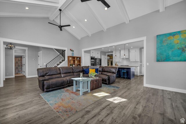 1932 W 200 N, Kaysville, UT 84037 - living room featuring hardwood / wood-style flooring, high vaulted ceiling, beam ceiling, and ceiling fan with notable chandelier