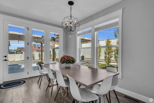 1932 W 200 N, Kaysville, UT 84037 - dining room with a notable chandelier and hardwood / wood-style flooring