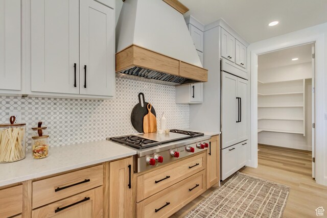 909 W 1180 N, Pleasant Grove, UT 84062 - kitchen with custom range hood, stainless steel gas stovetop, light countertops, backsplash, and recessed lighting