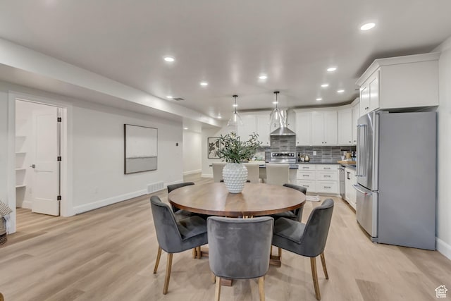909 W 1180 N, Pleasant Grove, UT 84062 - dining space featuring baseboards, light wood-style floors, and recessed lighting