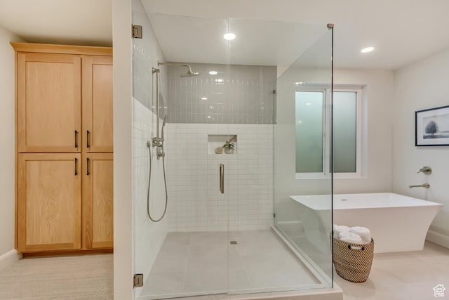 909 W 1180 N, Pleasant Grove, UT 84062 - full bathroom featuring a stall shower, a freestanding tub, and recessed lighting