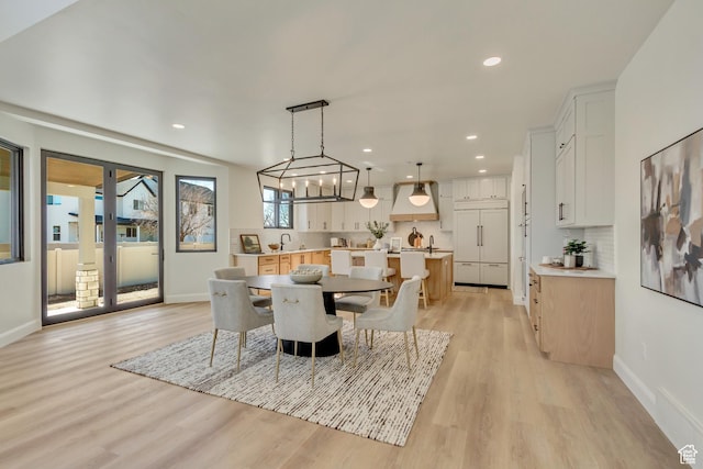 909 W 1180 N, Pleasant Grove, UT 84062 - dining space with light wood finished floors, baseboards, recessed lighting, and a chandelier
