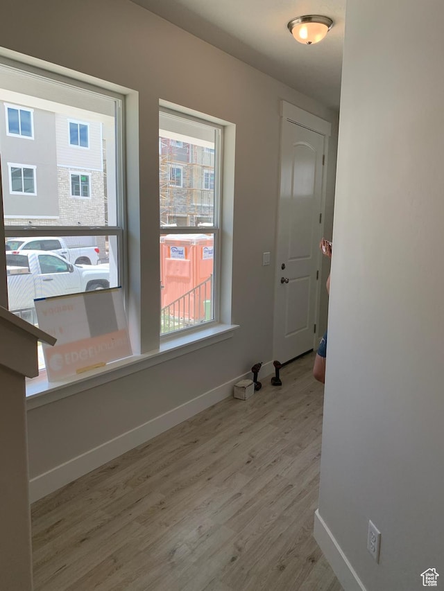 1538 N 3890th St W, Lehi, UT 84043 - foyer featuring baseboards, wood finished floors, and a healthy amount of sunlight