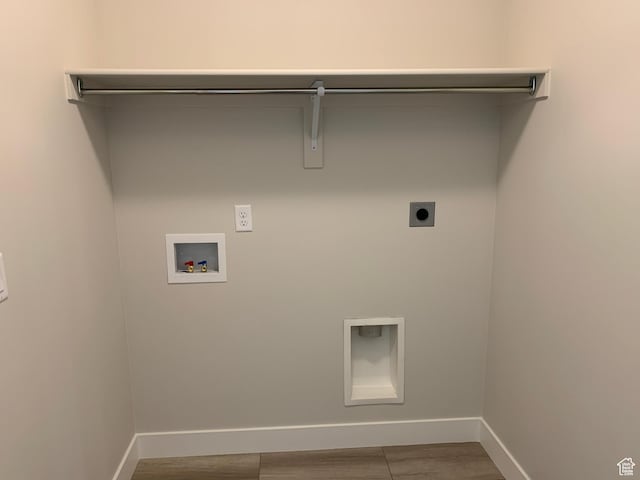1538 N 3890th St W, Lehi, UT 84043 - laundry room with washer hookup, wood finished floors, hookup for an electric dryer, laundry area, and baseboards