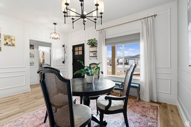 2418 W 4975 N, Cedar City, UT 84721 - dining room with a notable chandelier and light wood-type flooring