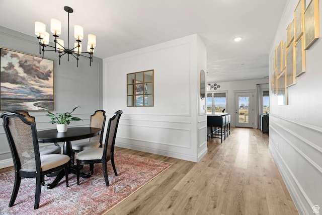 2418 W 4975 N, Cedar City, UT 84721 - dining area with an inviting chandelier and light hardwood / wood-style floors