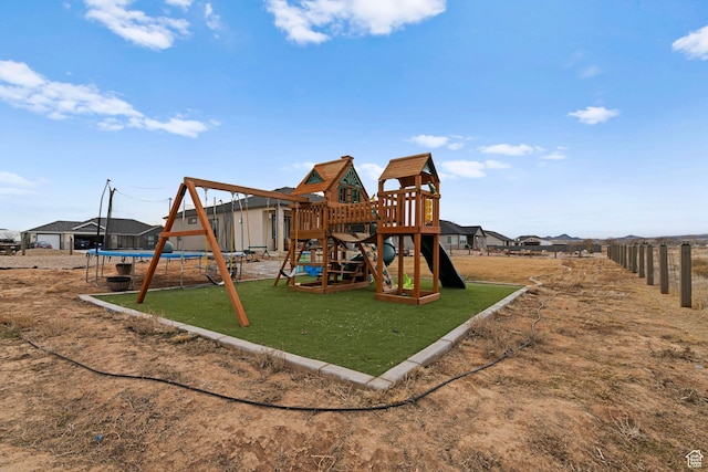 2418 W 4975 N, Cedar City, UT 84721 - view of jungle gym featuring a trampoline and a lawn