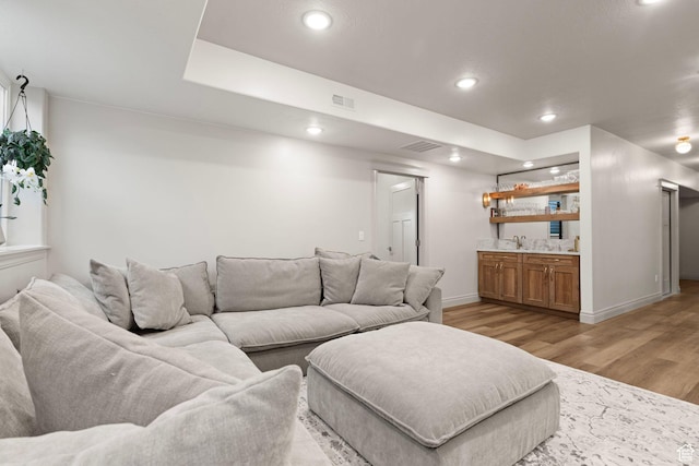 2418 W 4975 N, Cedar City, UT 84721 - living room with sink and light hardwood / wood-style floors