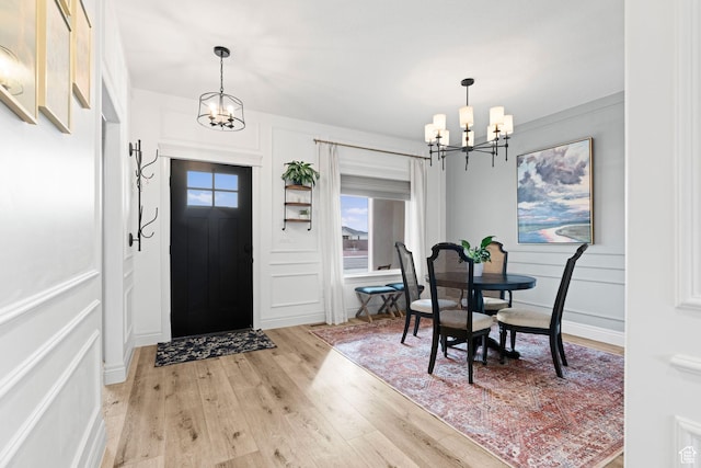 2418 W 4975 N, Cedar City, UT 84721 - foyer entrance featuring light hardwood / wood-style floors and a notable chandelier