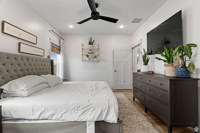 2418 W 4975 N, Cedar City, UT 84721 - bedroom with ceiling fan and light hardwood / wood-style floors