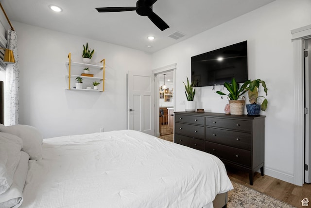 2418 W 4975 N, Cedar City, UT 84721 - bedroom with ceiling fan, hardwood / wood-style floors, and ensuite bath