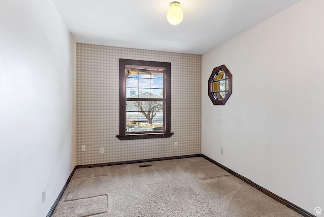view of carpeted spare room