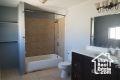bathroom featuring vanity and tub / shower combination