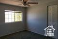 spare room featuring ceiling fan