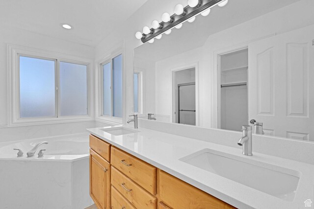 645 N 800 W, Brigham City, UT 84302 - bathroom featuring vanity and a bathing tub