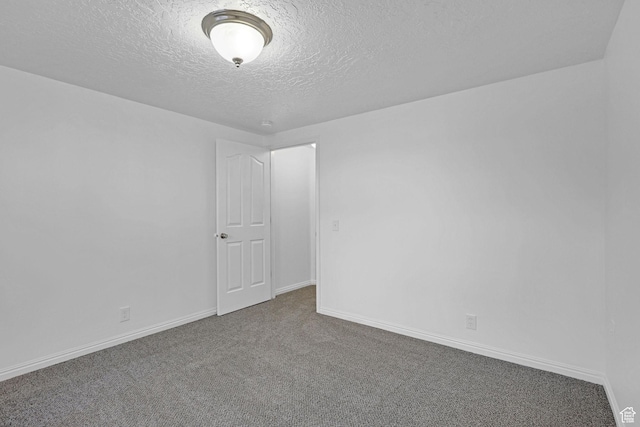 645 N 800 W, Brigham City, UT 84302 - carpeted empty room with a textured ceiling