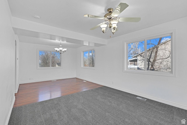 645 N 800 W, Brigham City, UT 84302 - carpeted spare room with ceiling fan with notable chandelier
