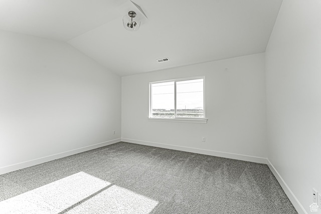 4696 S Alder Dr Unit 214, Mapleton, UT 84664 - carpeted empty room featuring vaulted ceiling and baseboards