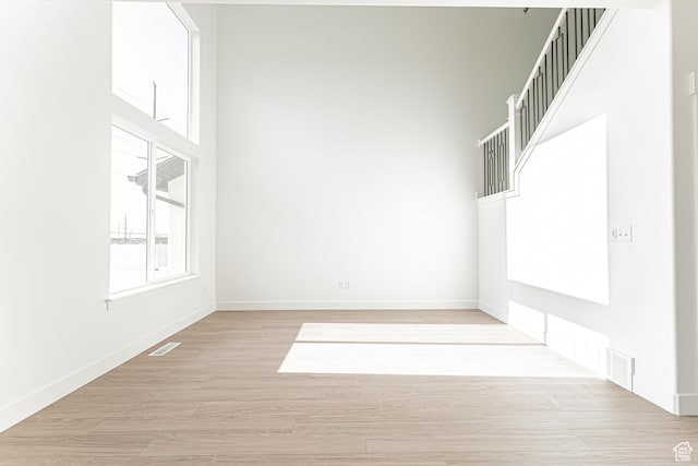 4696 S Alder Dr Unit 214, Mapleton, UT 84664 - empty room with baseboards and light wood-type flooring